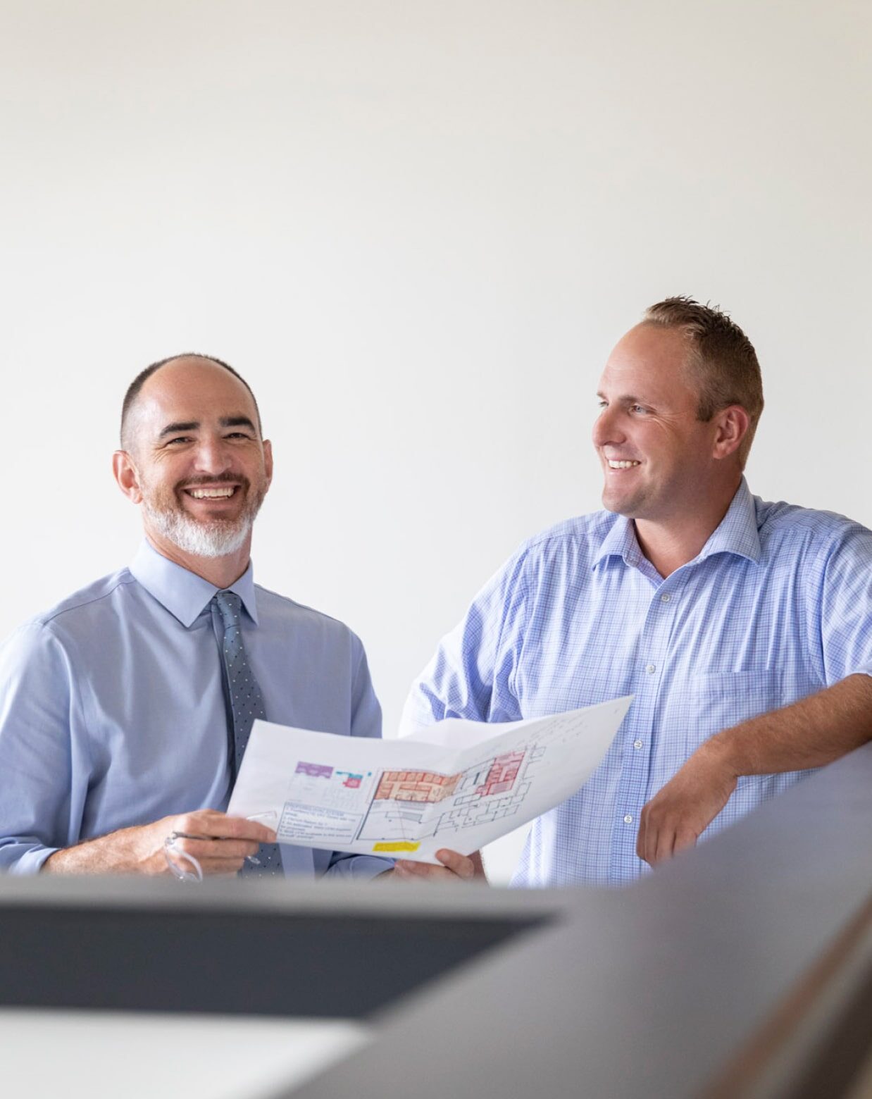 becker fondorf two men smiling