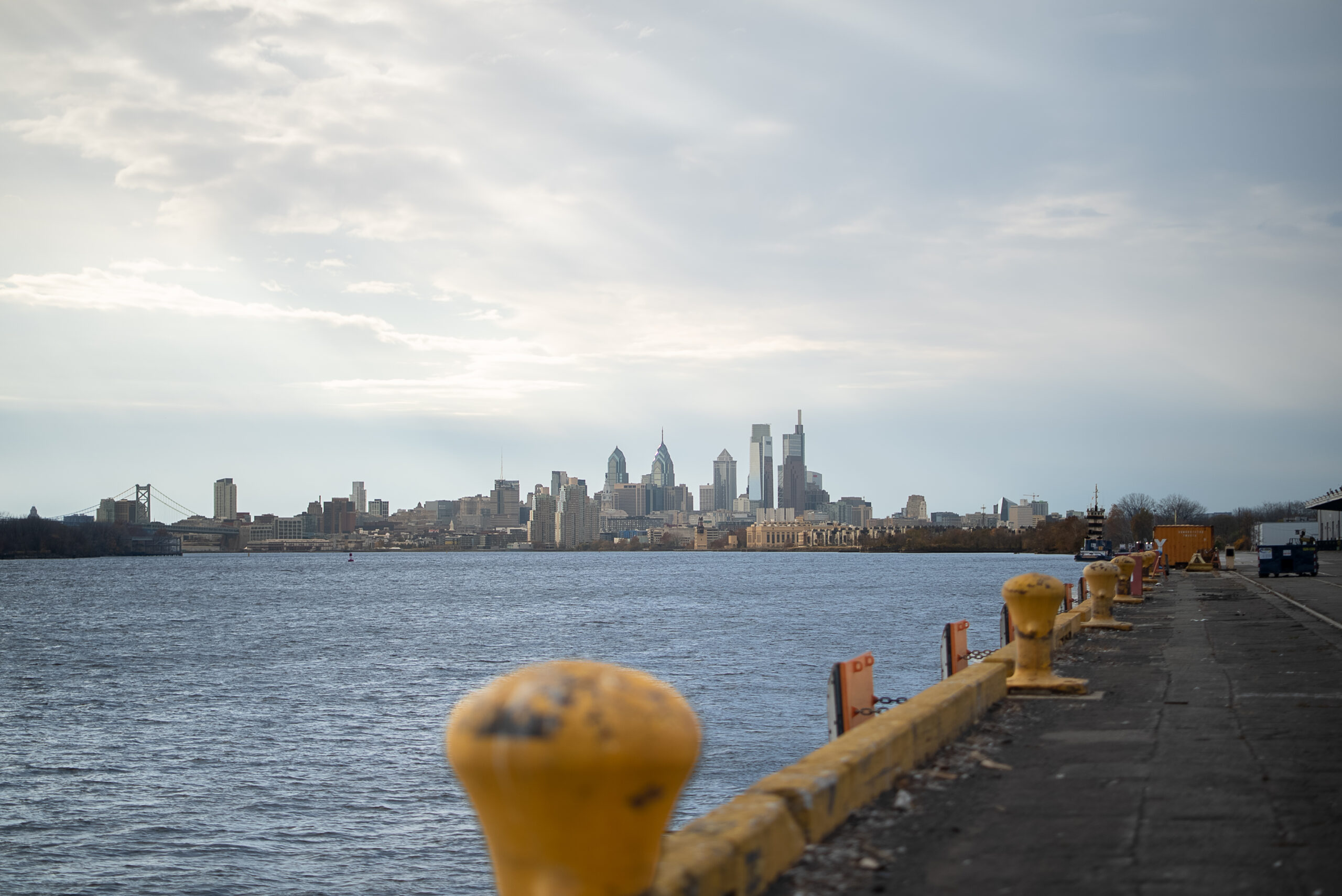 looking at the city over the water.